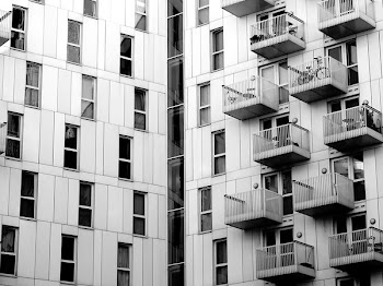 Grayscale Photo of High-rise Building