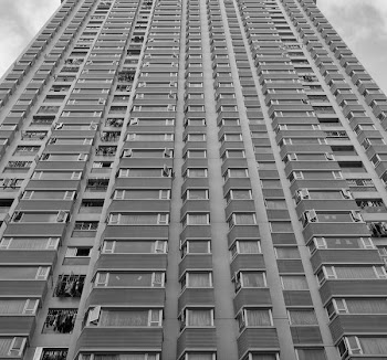 grayscale photo of high-rise building