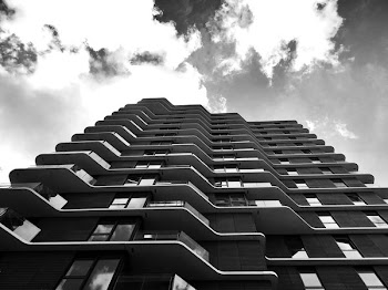 Grayscale Photo of High-rise Building