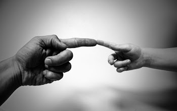 Grayscale Photo of Human Aligning Fingers