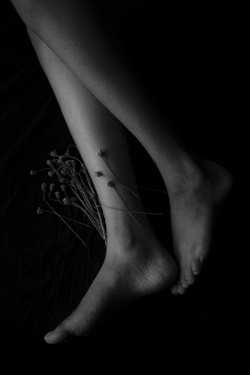 Grayscale Photo Of Human Feet