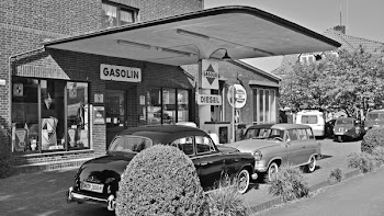 Grayscale Photo of Luxury Car