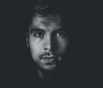 Grayscale Photo of Man's Face