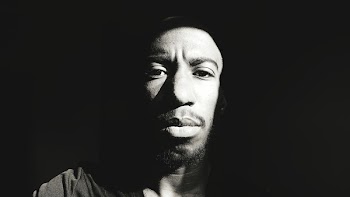 Grayscale Photo of Man's Face