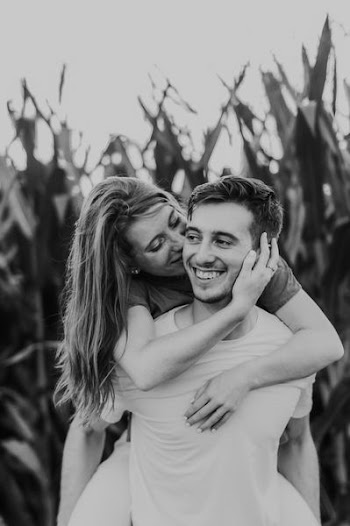 grayscale photo of man and woman