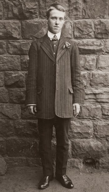 Grayscale Photo of Man in a Suit