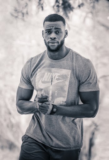Grayscale Photo Of Man In Nike Crew Neck T-shirt