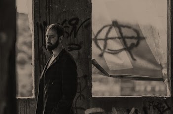 Grayscale Photo of Man in Suit Jacket