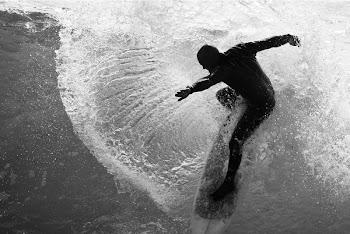 Grayscale Photo Of Man On Surfboard