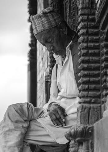 Grayscale Photo of Man Sleeping