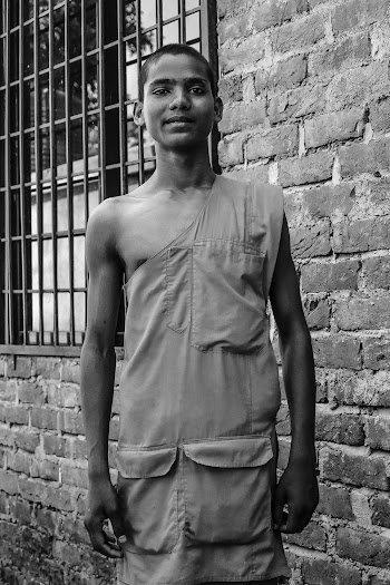 Grayscale Photo of Man Wearing Aprone