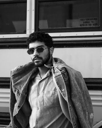 Grayscale Photo Of Man Wearing Denim Jacket And Sunglasses