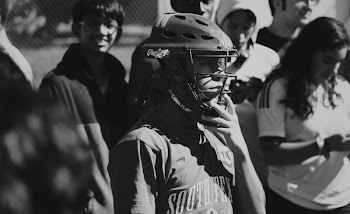 Grayscale Photo of Man Wearing Helmet