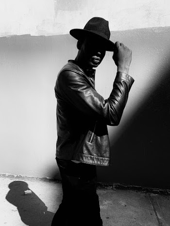 Grayscale Photo Of Man Wearing Leather Jacket