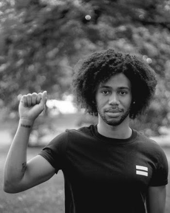 Grayscale Photo of Man Wearing T-shirt