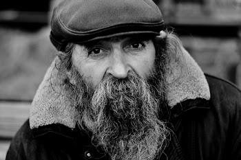 Grayscale Photo of Man With Hat