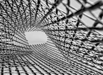 grayscale photo of metal mesh screen