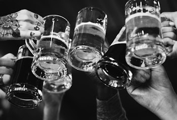 Grayscale Photo of People Cheers Glasses