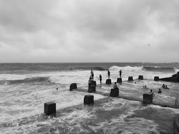 Grayscale Photo of People in Beach