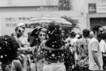 Grayscale Photo of People In The Street