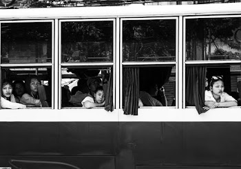 Grayscale Photo Of People Inside Bus