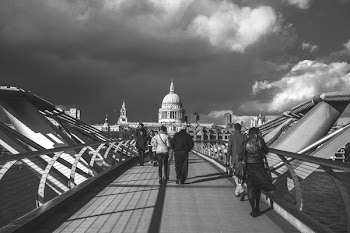 Grayscale Photo of People Walking in Pathway