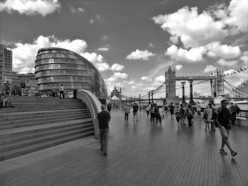 Grayscale Photo of People Walking Near Tower Bridge at London