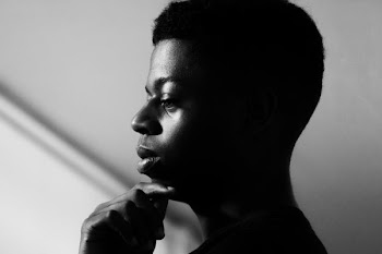 grayscale photo of person's face in side view