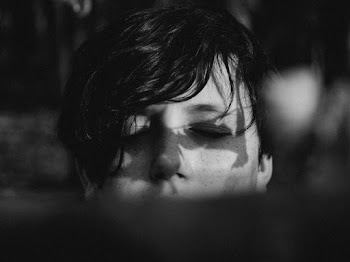 Grayscale Photo of Person Sleeping