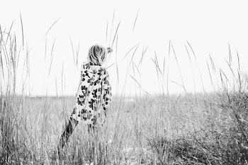 grayscale photo of person standing