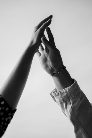 Grayscale Photo of Person Wearing Silver Bracelet · Free Stock Photo