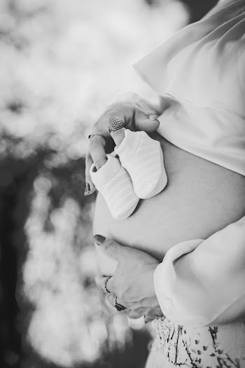 Grayscale Photo Of Pregnant Belly
