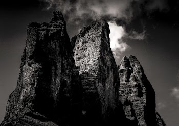 grayscale photo of rock formation