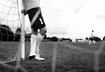 Grayscale Photo of Soccerplayer