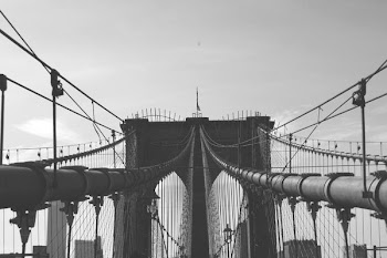 grayscale photo of stay-cable bridge