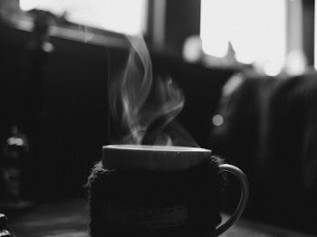 Grayscale Photo of Steaming Mug