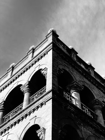 Grayscale Photo of the Corner of a Building