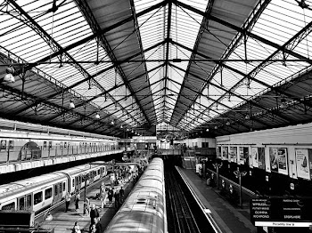 Grayscale Photo of Train Station