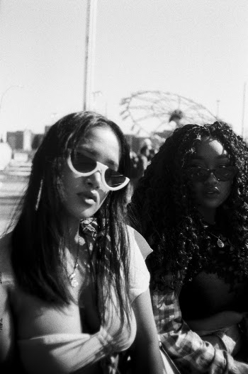 Grayscale Photo of Two Women 
