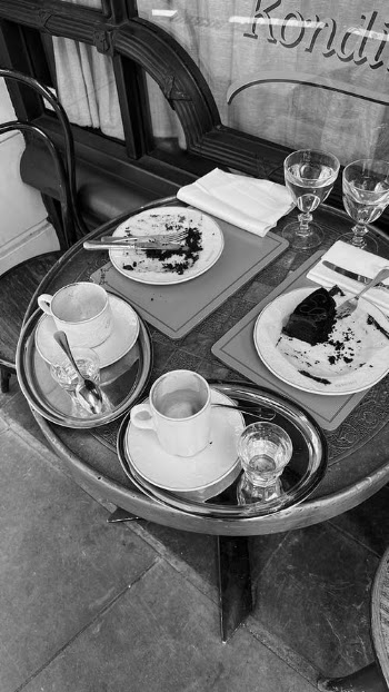 Grayscale Photo of Used Dishware on Table · Free Stock Photo