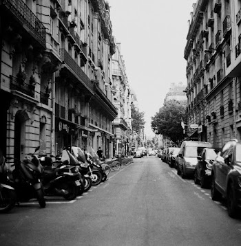 Grayscale Photo Of Vehicles Parked Outside Buildings