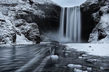 grayscale photo of waterfalls