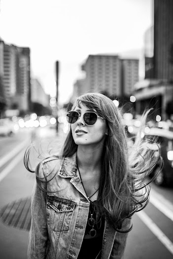 Grayscale Photo Of Woman In Denim Jacket