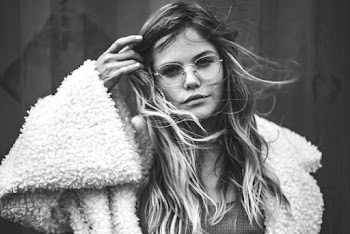 Grayscale Photo of Woman in Sheepskin Coat