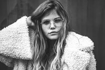 Grayscale Photo of Woman in Sheepskin Coat