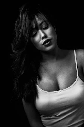 Grayscale Photo of Woman in Spaghetti Strap Top