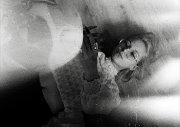 Grayscale Photo of Woman Lying Down