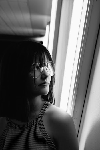 Grayscale Photo of Woman Wearing Aviator-style Eyeglasses