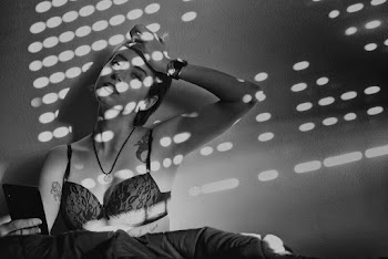 Grayscale Photo of Woman Wearing Bra
