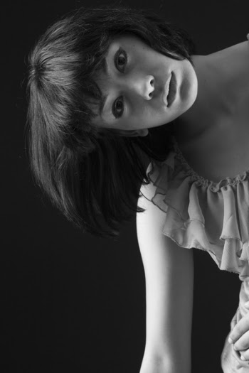 Grayscale Photo of Woman Wearing Cap-sleeved Top